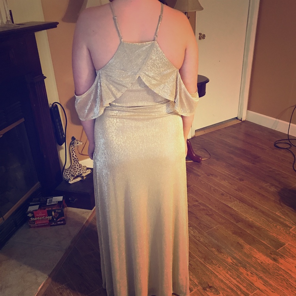 Long gold sequin dress.